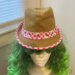 Tan color Hello Kitty brand Fedora style hat M/L 23” around in good condition